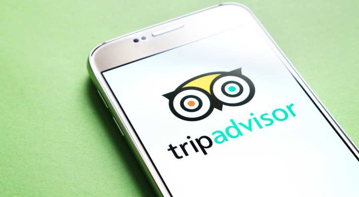 image of mobile phone screen displaying tripadvisor logo (TRIP)