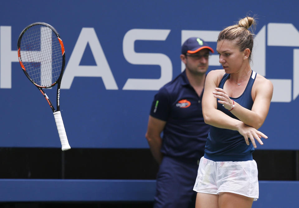 Tossing racket at Open