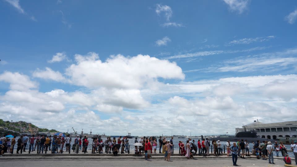 People line up to visit Russian frigate Admiral Gorshkov (not pictured) docked in Havana's bay, Cuba, June 13, 2024. - Alexandre Meneghini/Reuters