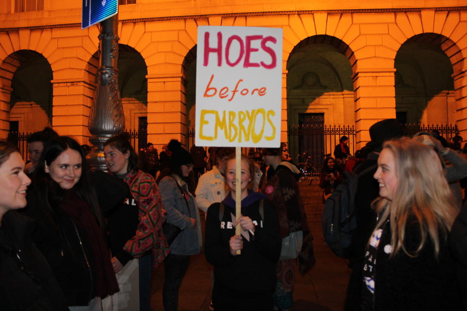 A protester raises a sign that reads "hoes before embryos" at the pro-choice rally. (Photo: Jesselyn Cook/HuffPost)