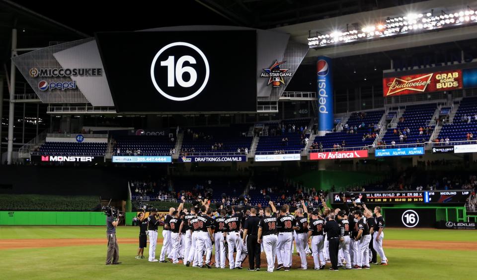 <p>Miami Marlins players all wearing jerseys bearing the number 16 and name Fernandez honor the late Jose Fernandez after the game against the New York Mets at Marlins Park on September 26, 2016 in Miami, Florida. (Photo by Rob Foldy/Getty Images) </p>