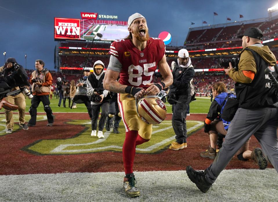 San Francisco 49ers tight end George Kittle yells as he walks off the field after defeating the Seattle Seahawks in a wild card game at Levi's Stadium.