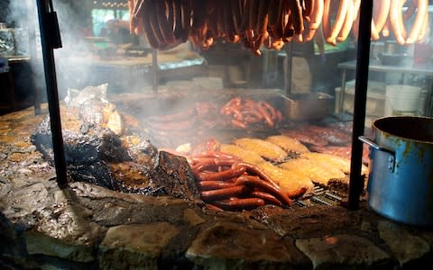 The pit at the Salt Lick BBQ - Credit: getty