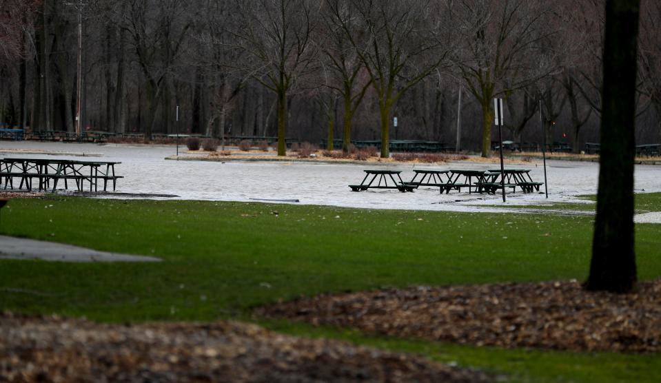 Bay Beach parking lots and picnic areas are flooded on Wednesday, April 29, 2020, in Green Bay.