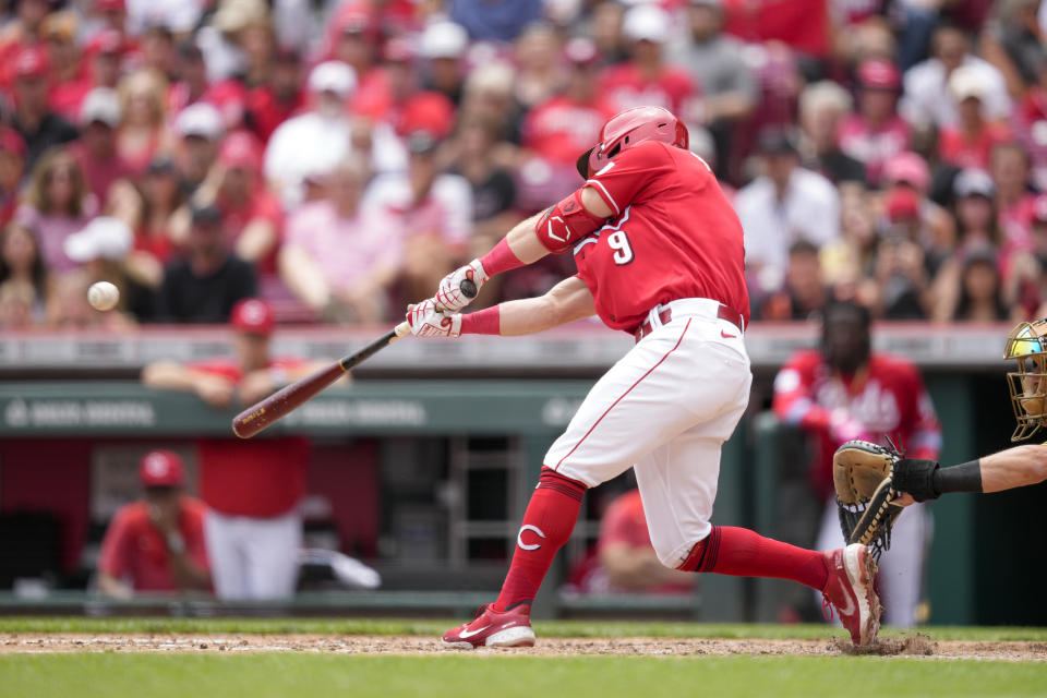 Cincinnati Reds' Matt McLain (9) hits an RBI double against the San Diego Padres during the third inning of a baseball game Saturday, July 1, 2023, in Cincinnati. (AP Photo/Jeff Dean)