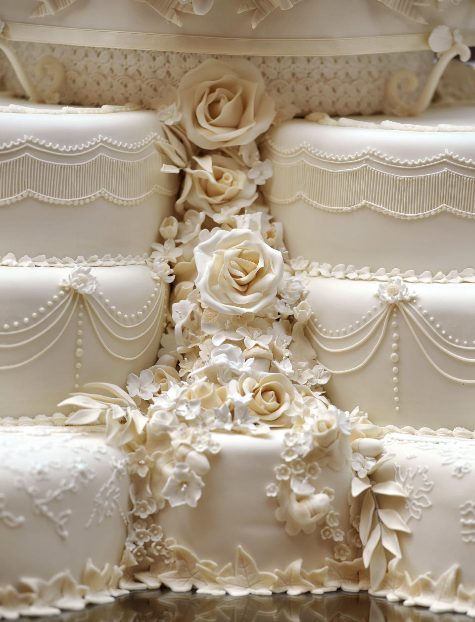 A detail of Prince William and his wife Catherine, the Duchess of Cambridge's eight tiered wedding cake, made by Fiona Cairns and her team, is photographed in the Picture Gallery inside Buckingham Palace in London April 29, 2011. REUTERS/John Stillwell/Pool