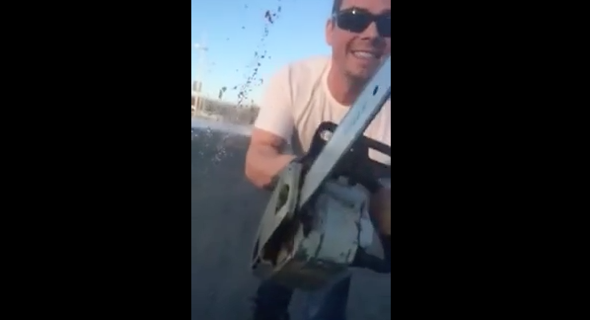 Man threatens family with chainsaw in terrifying road rage incident (video)