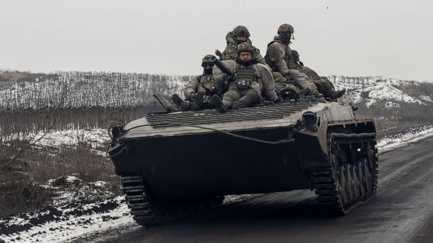 PHOTO: Ukrainian servicemen ride atop an infantry fighting vehicle along a road, amid Russia's attack on Ukraine, near a frontline in Donetsk region, Ukraine January 30, 2023. (Viacheslav Ratynskyi/Reuters)