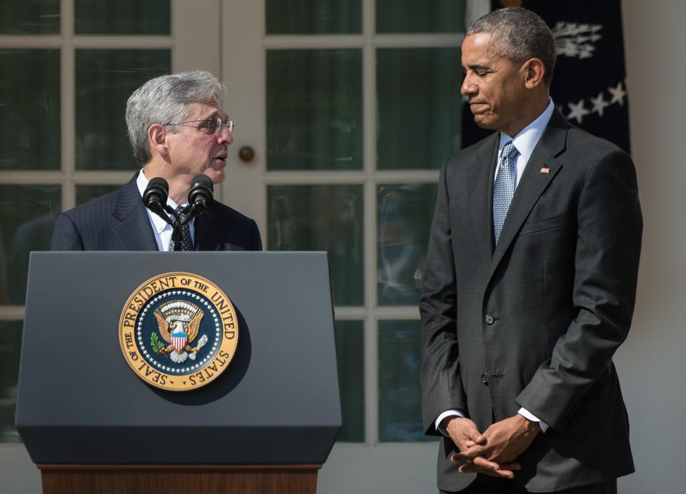 US Supreme Court nominee Merrick Garland looks at President Barack Obama after he announced his nomination in the Rose Garden at the White House in Washington, D.C., on March 16, 2016. (Photo: NICHOLAS KAMM via Getty Images)