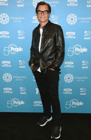 <p>Dimitrios Kambouris/Getty Images</p> Harry Hamlin attends the opening of the PEOPLE: Celebrating 50 Years exhibit in New York City on May 9, 2024