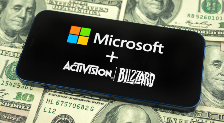 Microsoft and Activision Blizzard logo on smartphone screen close-up. tech stocks