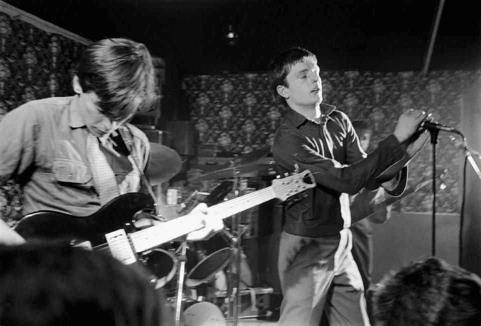 UNITED KINGDOM - MARCH 14:  Photo of JOY DIVISION; Bernard Sumner & Ian Curtis performing live onstage at Bowdon Vale Youth Club  (Photo by Martin O'Neill/Redferns)