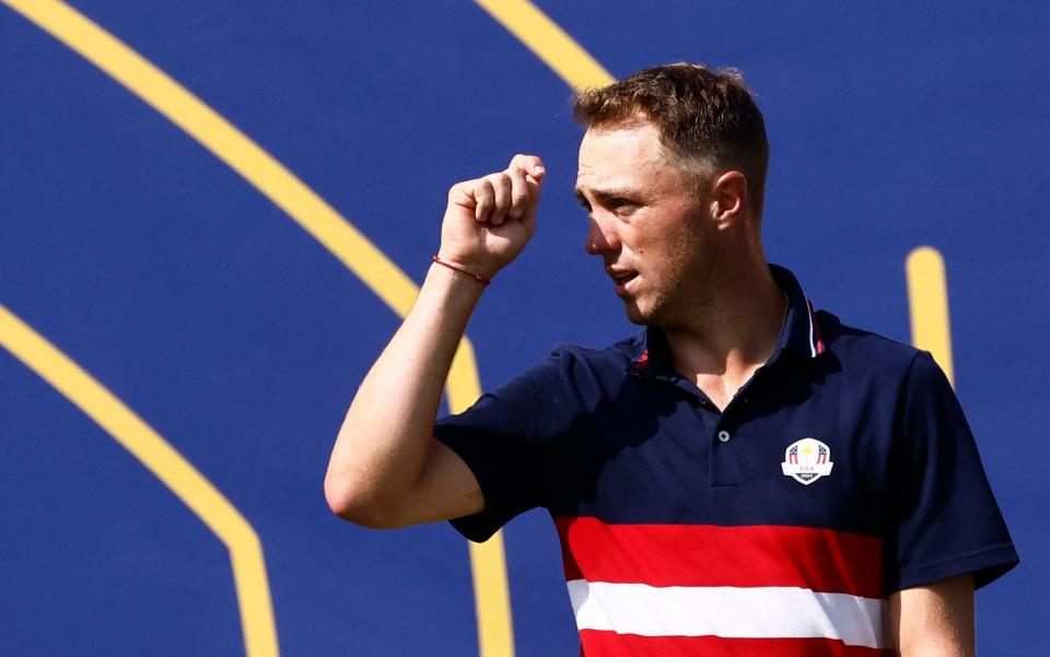 Team USA's Justin Thomas acknowledges the crowd on the 1st hole during the Singles