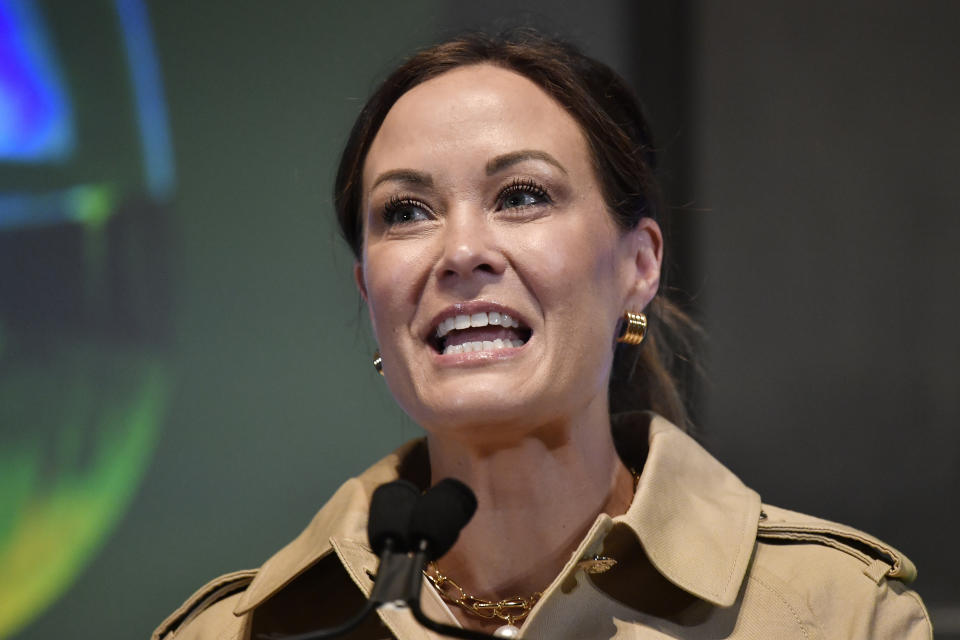 Kentucky Lt. Gov. Jacqueline Coleman speaks before a gathering to celebrate the 25th anniversary of the Kentucky Bourbon Trail at the Frazier History Museum in Louisville, Ky., Thursday, June 20, 2024. (AP Photo/Timothy D. Easley)