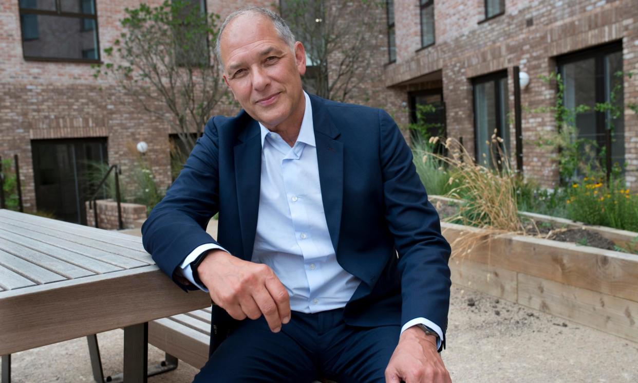 <span>Marc Vlessing, chief executive of Pocket Living, at a development in Walthamstow.</span><span>Photograph: Sophia Evans/The Observer</span>