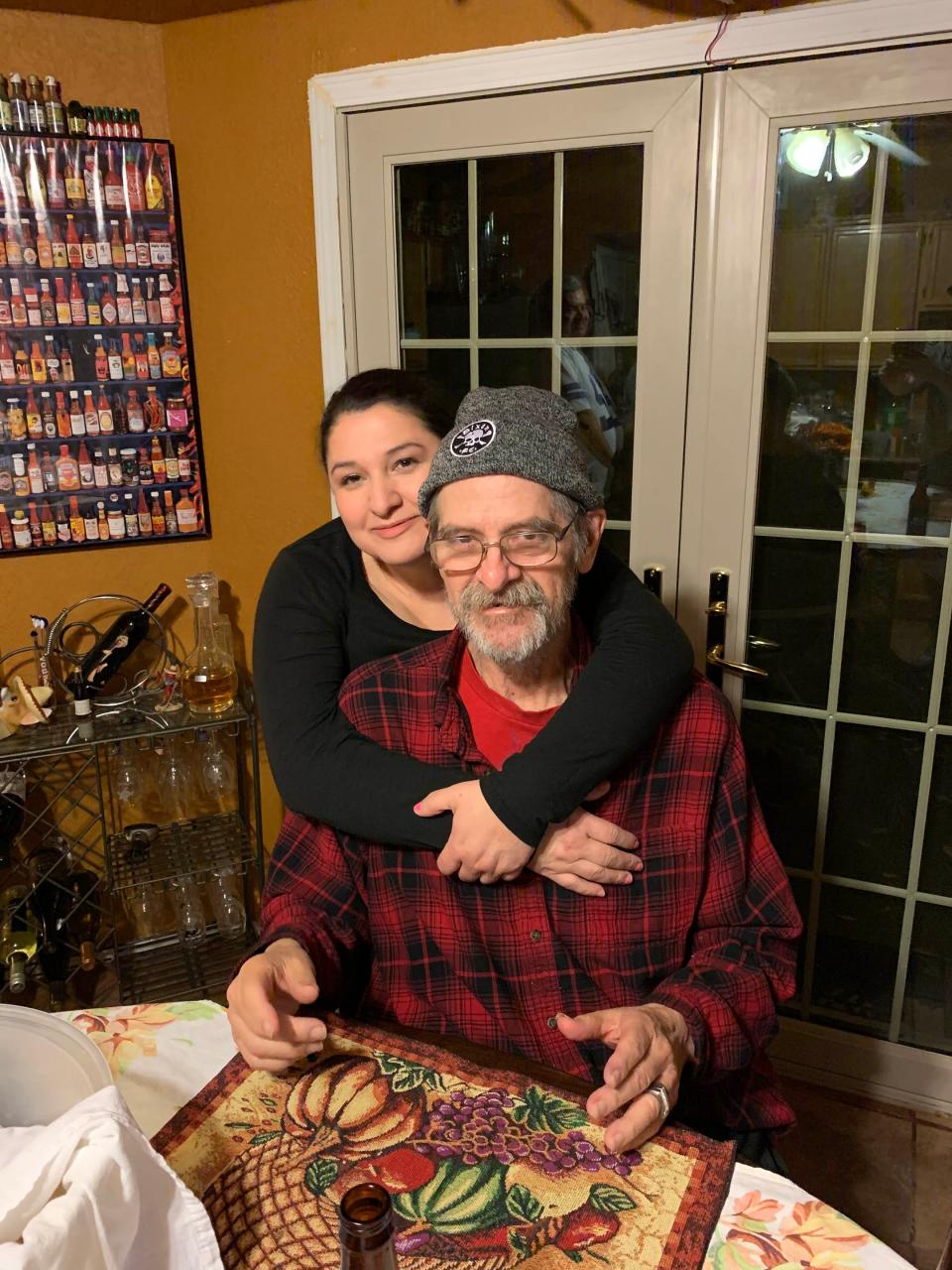 Debbie Navejas Aguilar with her father Armando Navejas in El Paso on Thanksgiving in 2020.