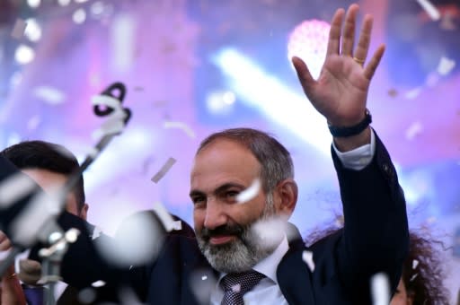 Armenian opposition leader Nikol Pashinyan waves to supporters after being elected prime minister last month