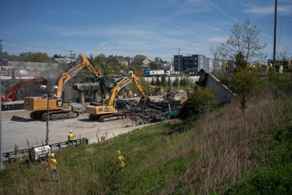 Traffic on I-95 is diverted at Exit 14 as crews demolish the Fairfield Ave. Bridge Saturday. Douglas Healey