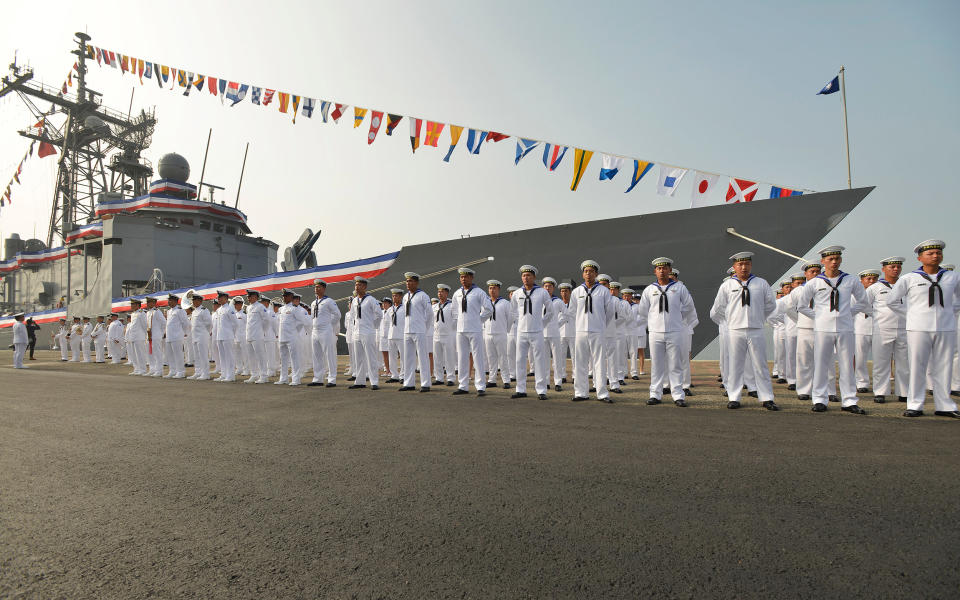 Image: Taiwan sailors parade in front of a new frigate during a ceremony to commission two Perry-class guided missile frigates from the U.S. into the Taiwan Navy, in the southern port of Kaohsiung (Chris Stowers / AFP via Getty Images)