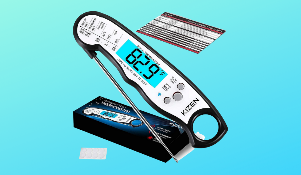 A black and white Kizen meat thermometer reads 