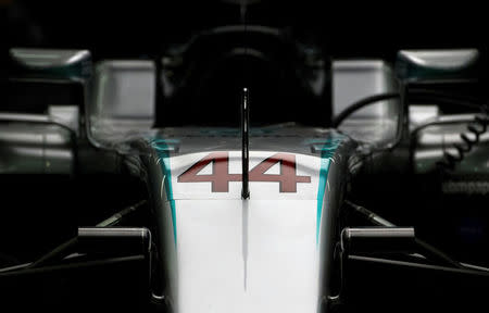 Mercedes' Lewis Hamilton of Britain car is seen in the team garage at the Marina Bay street circuit ahead of the Singapore F1 Grand Prix Night Race in Singapore, September 15, 2016. REUTERS/Jeremy Lee