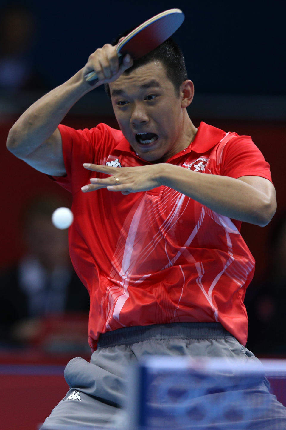 "Ahh spider!"<br> LONDON, ENGLAND - JULY 29: Peng Tang of Hong Kong plays a forehand in his Men's Singles Table Tennis second round match against Noshad Alamiyan of Iran on Day 2 of the London 2012 Olympic Games at ExCeL on July 29, 2012 in London, England. (Photo by Feng Li/Getty Images)