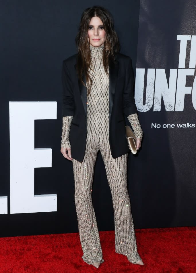 Sandra Bullock opted for a look courtesy of designer Stella McCartney with a sleek black blazer over top. - Credit: MEGA