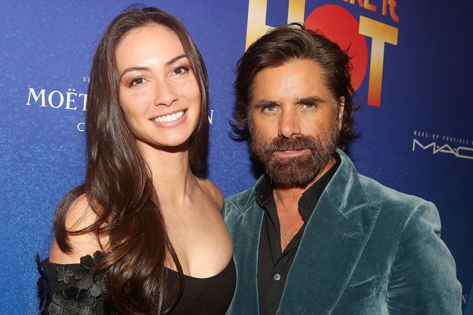 Caitlin McHugh Stamos and John Stamos pose at the opening night of the new musical "Some Like It Hot!" on Broadway at The Shubert Theatre on December 11, 2022 in New York City.