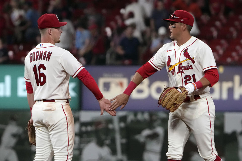 St. Louis Cardinals' Nolan Gorman (16) and Lars Nootbaar (21) celebrate a 9-6 victory over the Washington Nationals in the second game of a baseball doubleheader Saturday, July 15, 2023, in St. Louis. (AP Photo/Jeff Roberson)
