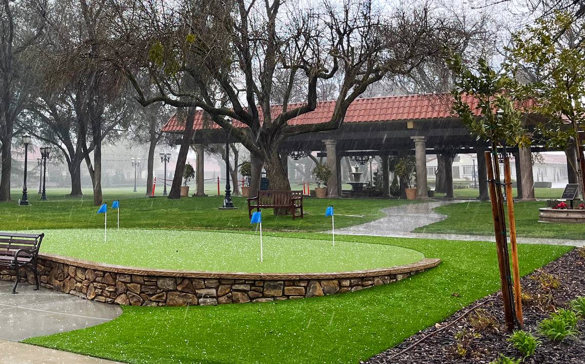 Hail falls on the putting green on the north side of The Vineyards, the independent living unit of the California Armenian Home on Saturday afternoon, March 11, 2023, east of Fresno. The photograph was taken by The Vineyards resident Fran Shellenberger on an afternoon walk around 4:30 p.m.