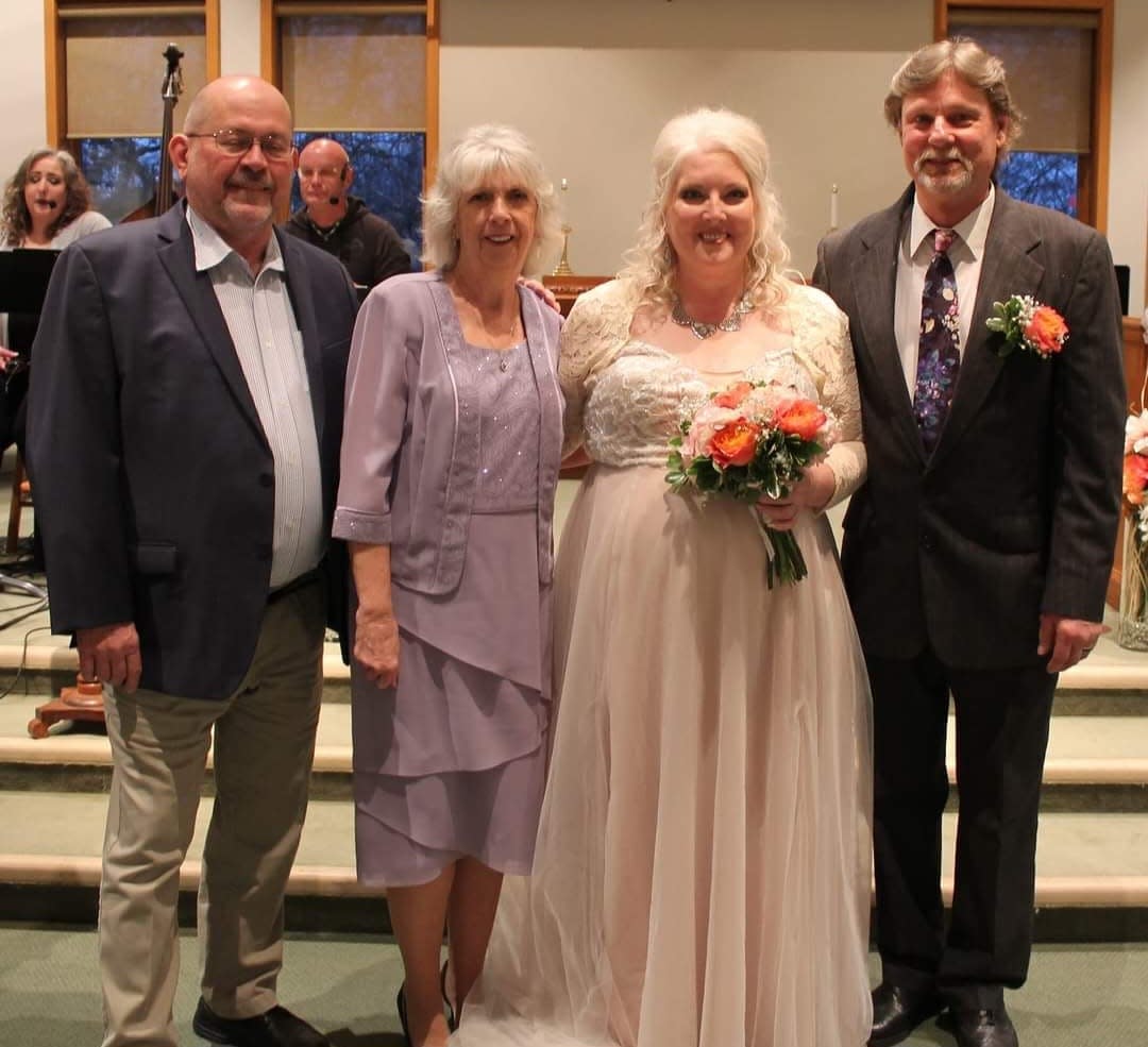 Teri Sebesta and her husband Bob stand with Vic and Norma Snodgrass following Teri and Bob's wedding on Nov. 12, 2022 at Northwest United Methodist Church in Peoria. Vic and Norma were killed in a three-vehicle crash Saturday afternoon at the intersection of Illinois 29 and Illinois 6.