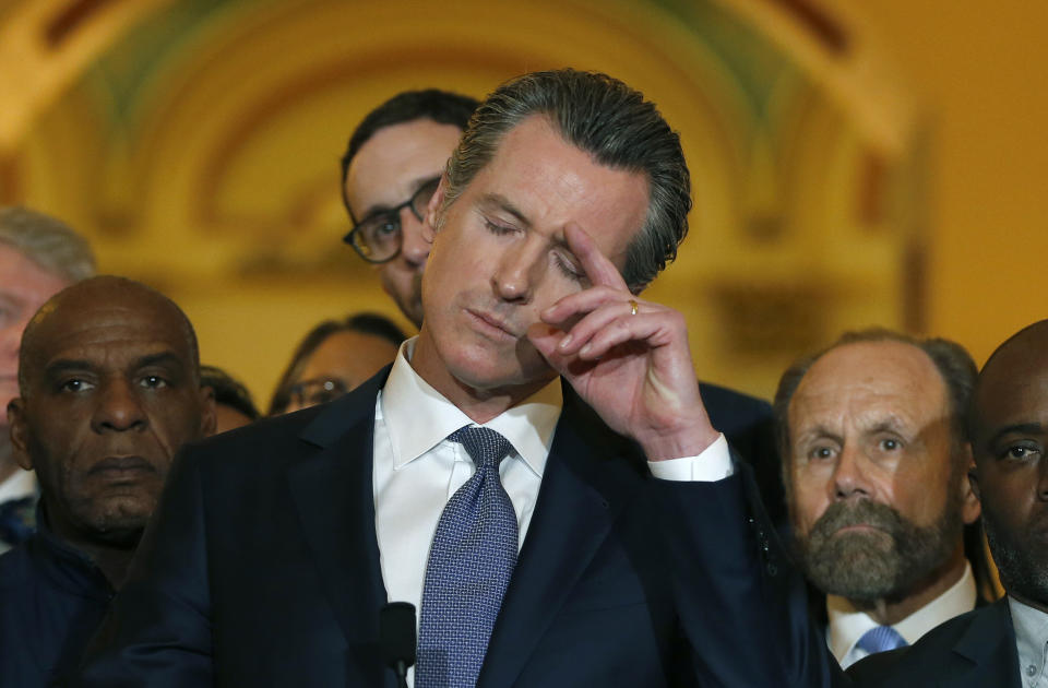 California Gov. Gavin Newsom pauses as he responds to a reporter's question about his decision to place a moratorium on the death penalty during a news conference at the Capitol, Wednesday, March 13, 2019, in Sacramento, Calif. (AP Photo/Rich Pedroncelli)