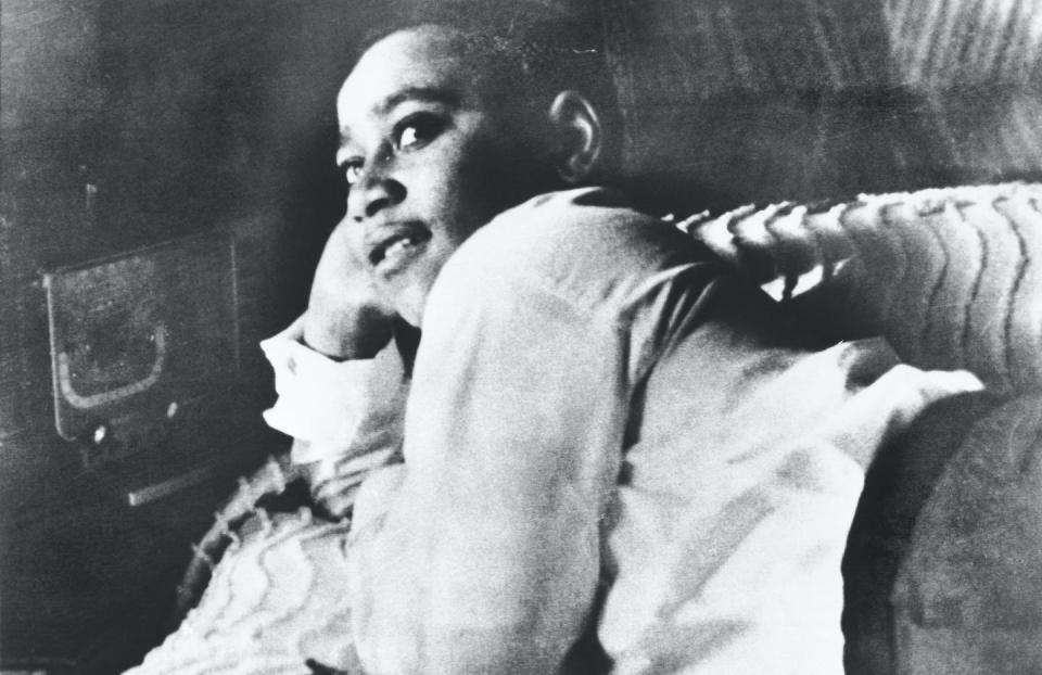 Emmett Till is shown lying on his bed in 1954, one year before his murder. <a href="https://media.gettyimages.com/id/514974304/photo/emmett-till.jpg?s=1024x1024&w=gi&k=20&c=H_59CkJeGX1ESuR52wL2c8X9aDnSxek6F17MCsU0L_E=" rel="nofollow noopener" target="_blank" data-ylk="slk:Bettmann/Contributor;elm:context_link;itc:0;sec:content-canvas" class="link ">Bettmann/Contributor</a>