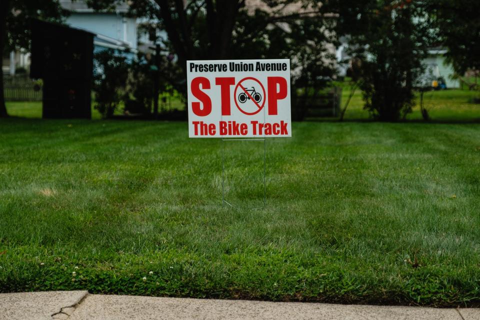 'Stop The Bike Track' signs can be seen along Union Ave., Wednesday, Aug. 30 in New Philadelphia.