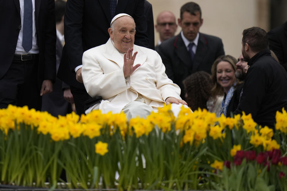 Pope Francis smiles at the end of his weekly general audience in St. Peter's Square, at the Vatican, Wednesday, April 3, 2024. (AP Photo/Alessandra Tarantino)