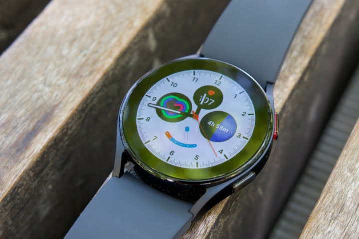 The Samsung Galaxy Watch 5 laying on a bench.