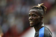 Crystal Palace's Wilfried Zaha looks on during the English Premier League soccer match between Sheffield United and Crystal Palace at Bramall Lane in Sheffield, England, Sunday, Aug. 18, 2019. (AP Photo/Rui Vieira)