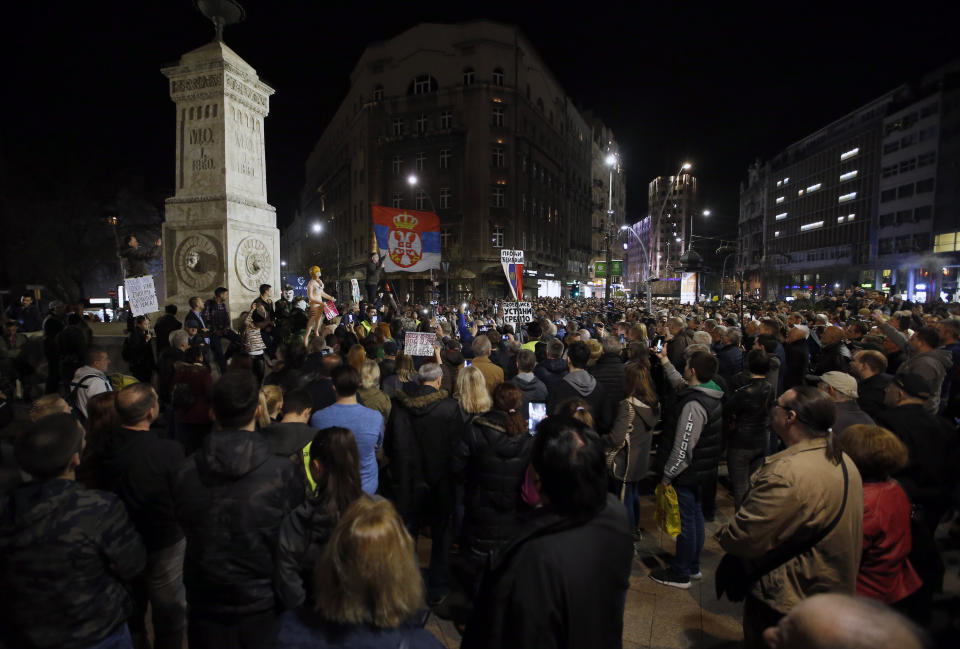 People attend a protest at Belgrade's Terazije square, Serbia, Saturday, March 9, 2019. The demonstrations in Serbia have lasted for three months seeking more democracy in the Balkan country that is firmly under control of the populist leader Aleksandar Vucic. (AP Photo/Darko Vojinovic)