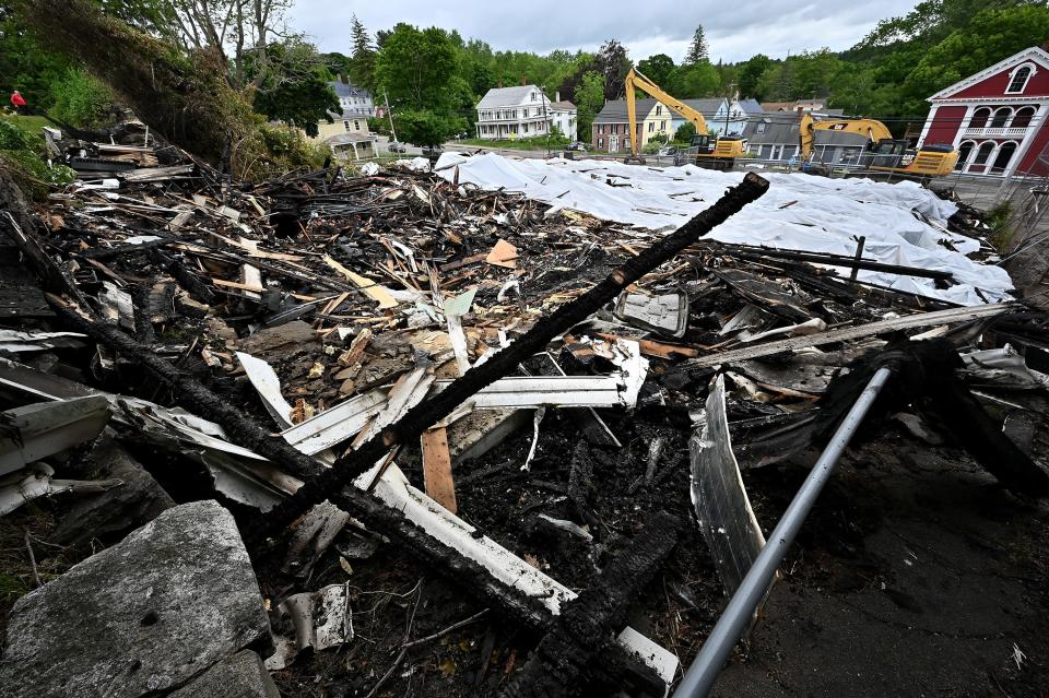 First Congregational Church of Spencer is now just partially-covered wreckage.