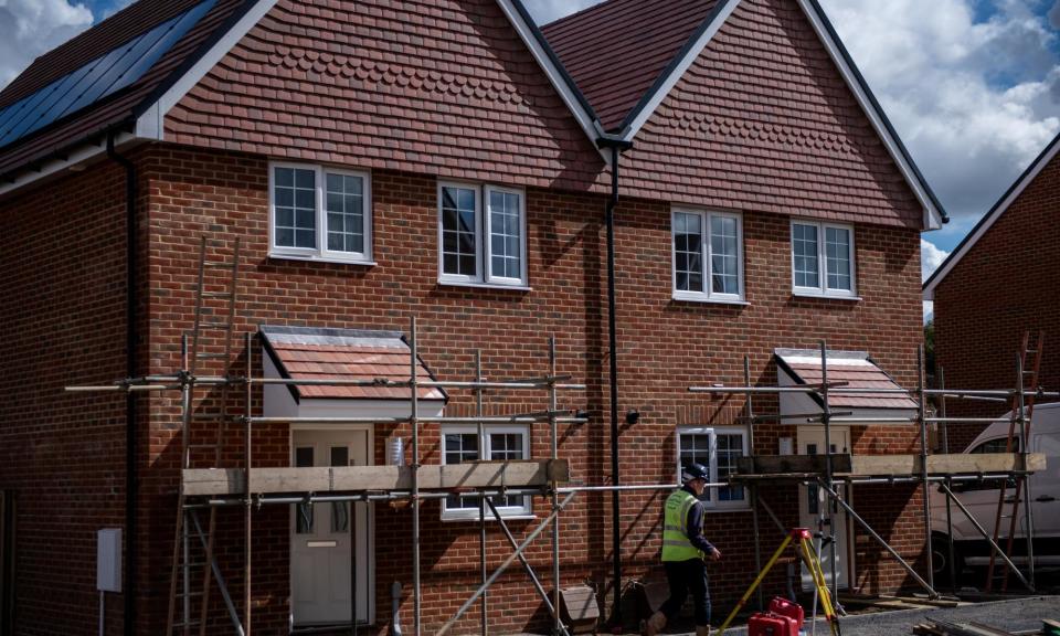 <span>New homes under construction in Whitstable, Kent.</span><span>Photograph: Chris J Ratcliffe/Reuters</span>