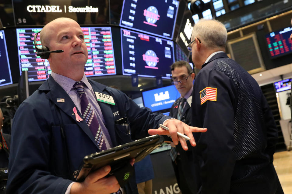 Traders work on the floor of the New York Stock Exchange (NYSE) in New York, U.S., January 10, 2019. REUTERS/Brendan McDermid