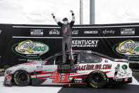 Cole Custer (41) celebrates after winning a NASCAR Cup Series auto race Sunday, July 12, 2020, in Sparta, Ky. (AP Photo/Mark Humphrey)