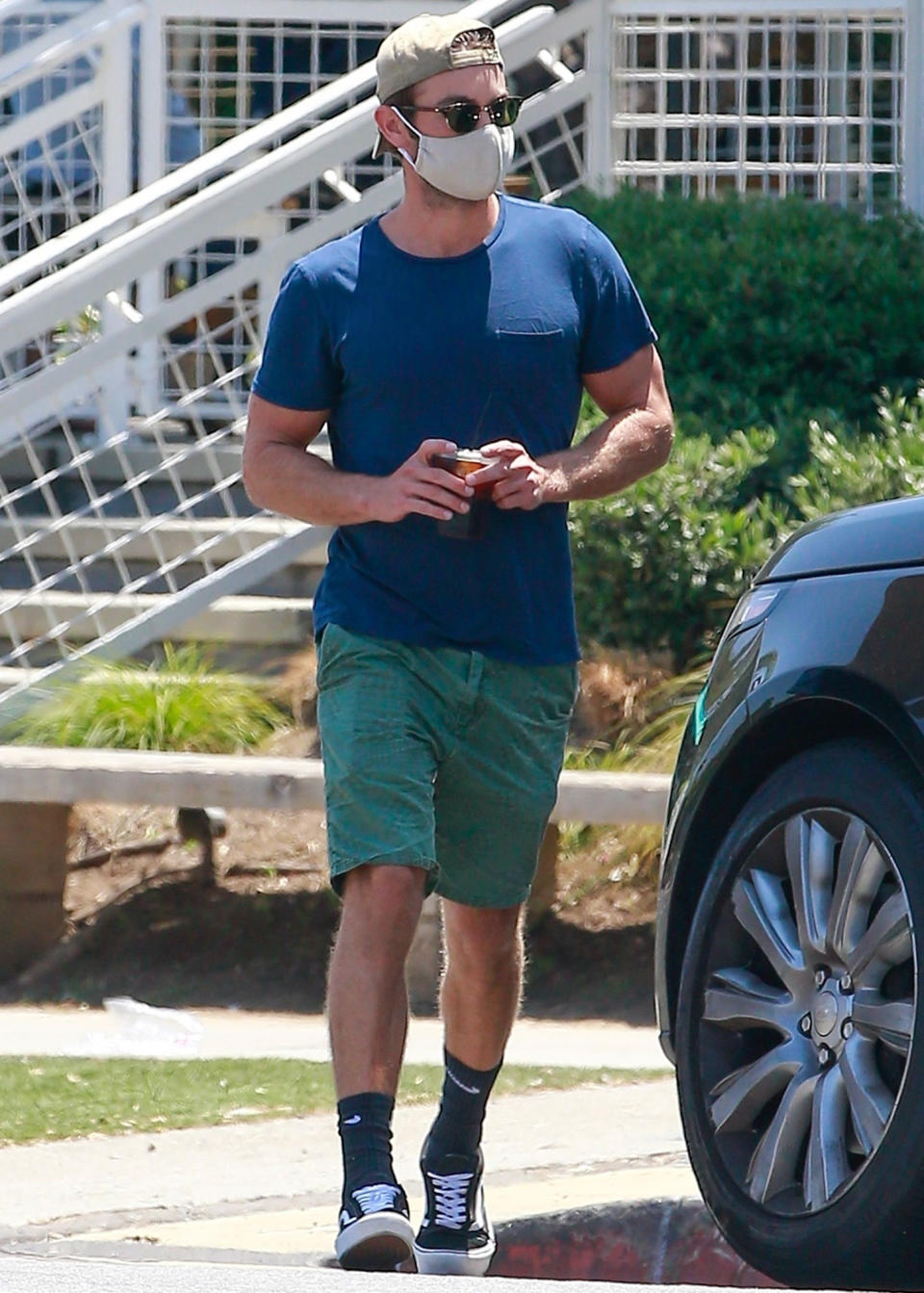 <p>A masked Chace Crawford runs errands on Friday in Los Angeles. </p>