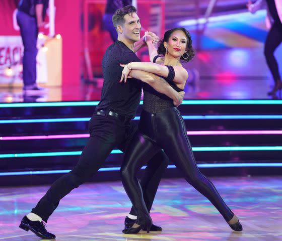 <p>Christopher Willard via Getty </p> (L-R) Cody Rigsby dances with Cheryl Burke on 'Dancing with the Stars' in October 2021.