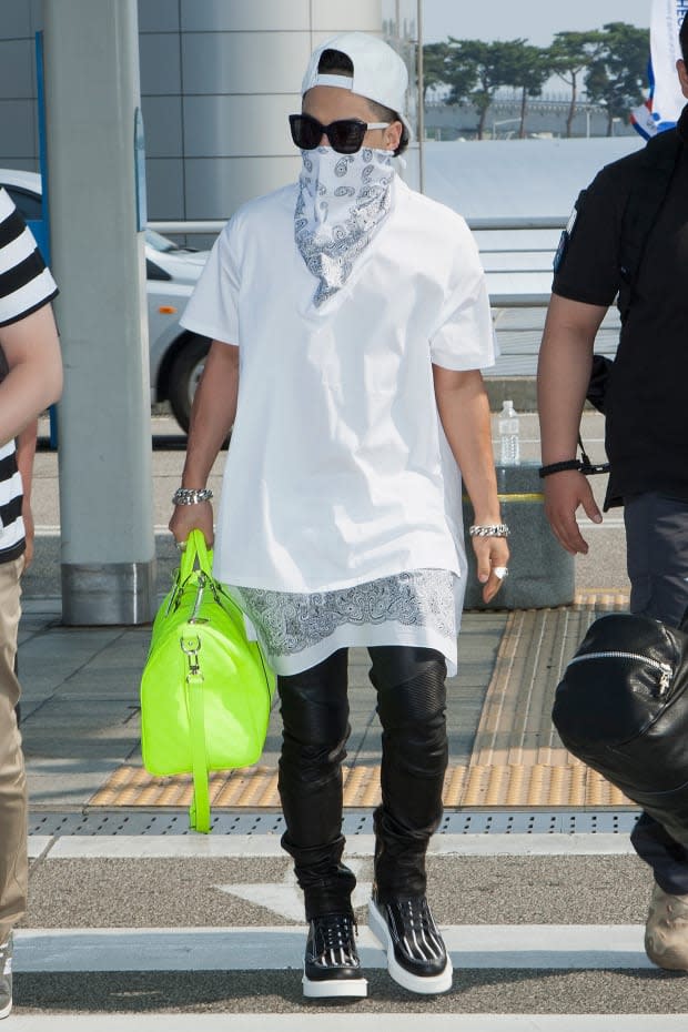 <p>Taeyang at Incheon International Airport in 2013.</p>