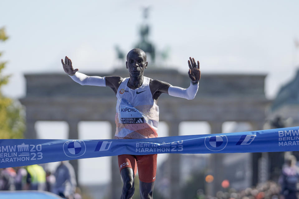 Kenya's Eliud Kipchoge crosses the line to win the men's division of the Berlin Marathon in Berlin, Germany, Sunday, Sept. 24, 2023. (AP Photo/Markus Schreiber)