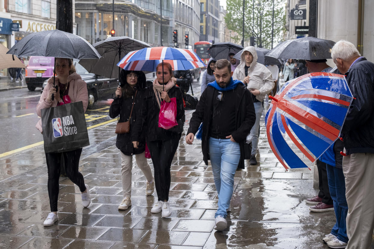 Bank holiday Monday rain does not discourage the many shoppers and visitors out on Oxford Street who brave the bad weather using Union Flag umbrellas on 6th May 2024 in London, United Kingdom. Oxford Street is a major retail centre in the West End of the capital and is Europes busiest shopping street with around half a million daily visitors to its approximately 300 shops, the majority of which are fashion and high street clothing stores. (photo by Mike Kemp/In Pictures via Getty Images)