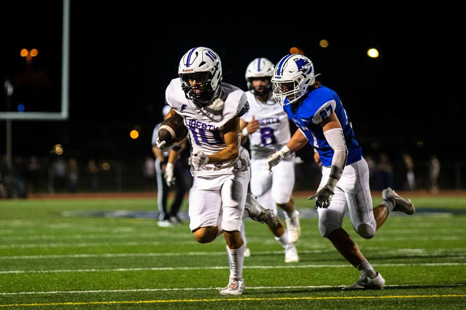 Iowa City Liberty's Garrett Gregoire made a crucial catch late in Liberty's 29-28 victory over Burlington Friday at Bracewell Stadium in Burlington.