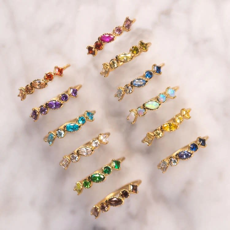 different colored birthstone rings on gold band