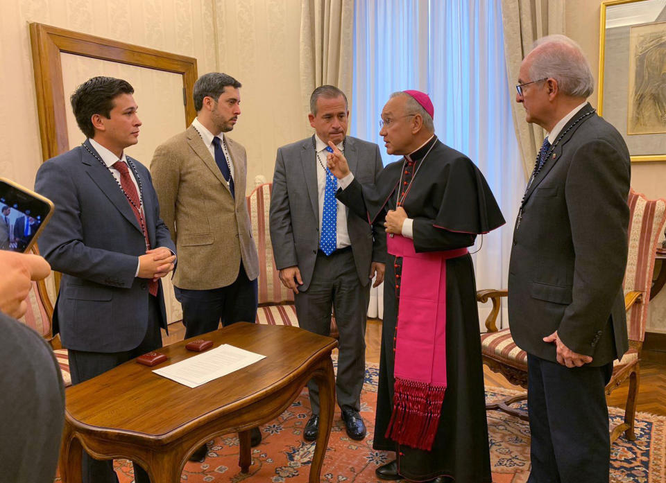 FILE - Then-Deputy Vatican secretary of state Monsignor Edgar Peña Parra, second from right, receives a Venezuelan delegation representing opposition leader Juan Guaido, at the Vatican, Monday, Feb. 11, 2019. Pope Francis’ chief of staff Monsignor Edgar Pena Parra became one of the highest-ranking Holy See officials to testify in a foreign court Thursday, July 4, 2024, giving a British tribunal a detailed explanation of the negotiations at the heart of the Vatican’s so-called “trial of the century” and pointing a finger at his onetime deputy who escaped the scandal unscathed. (Imperatrice Bruno/UCG photo via AP, File)